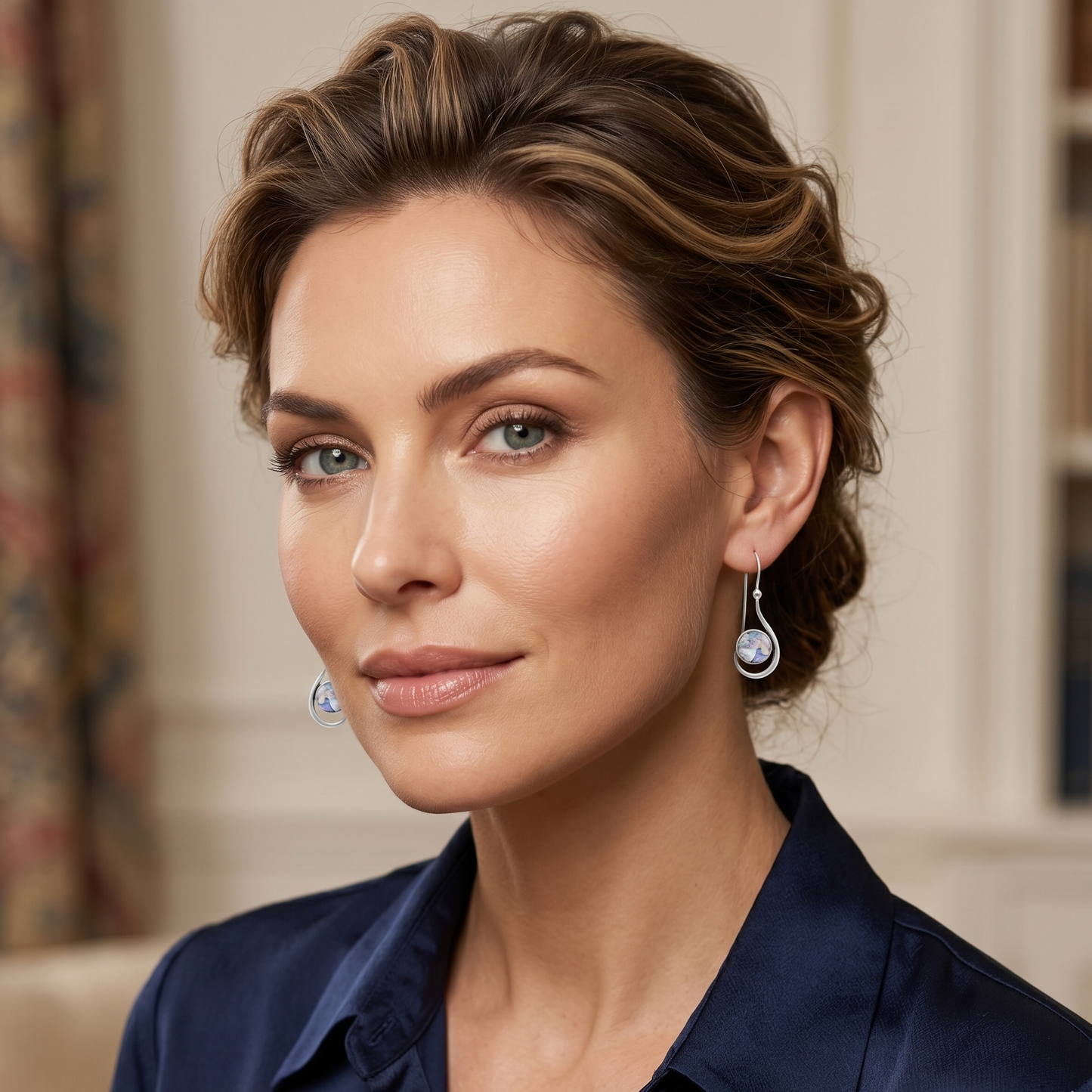 Woman wearing earrings in a well-lit room