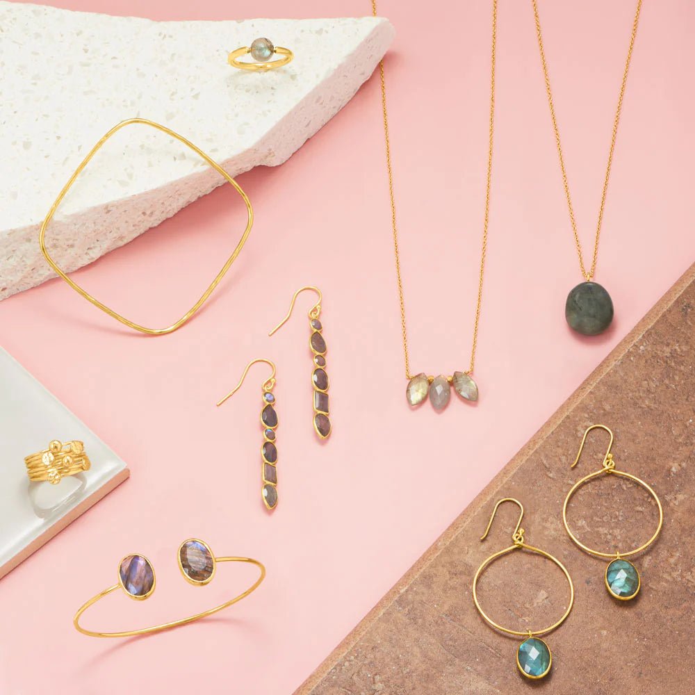 Add some sparkle to your look with our 14K Gold-Plated Textured Square Bangle.