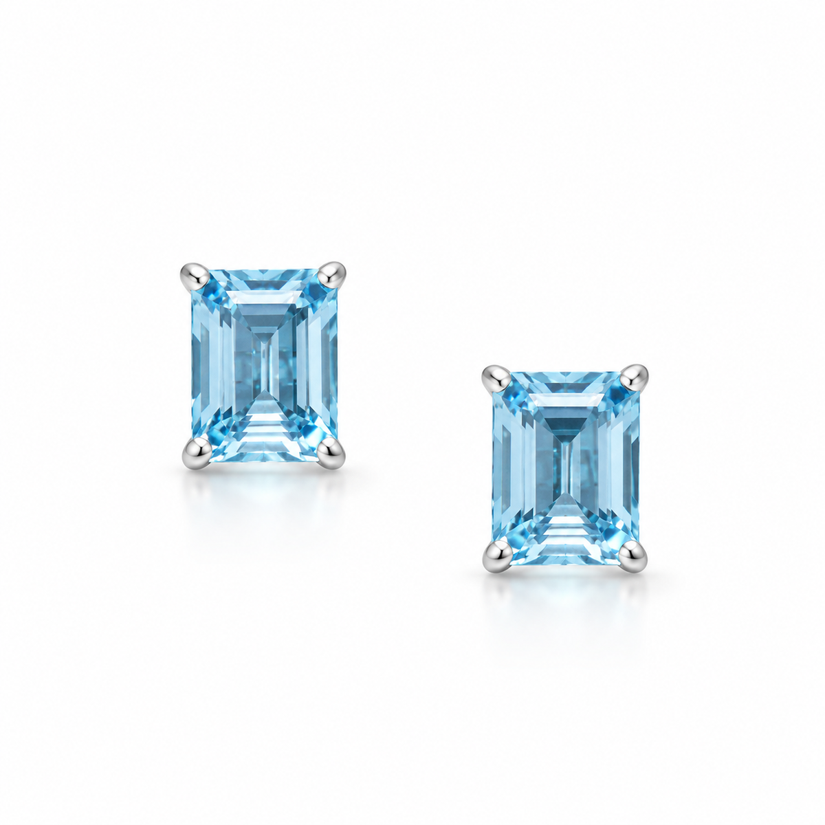 Sky Blue Topaz Stud Earrings Rhodium Plated 925 Sterling Silver 8x6mm Emerald Cut
