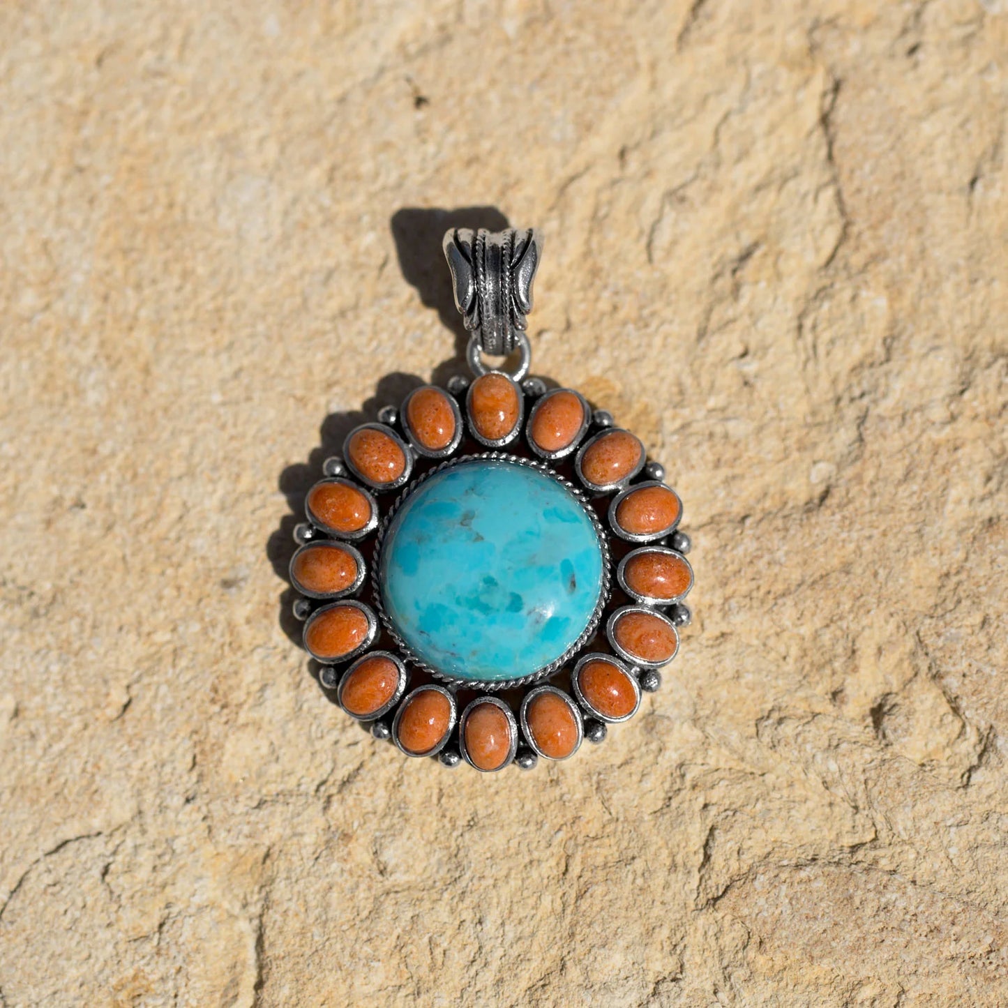 Sunburst Pendant Made of Reconstituted Turquoise and Coral