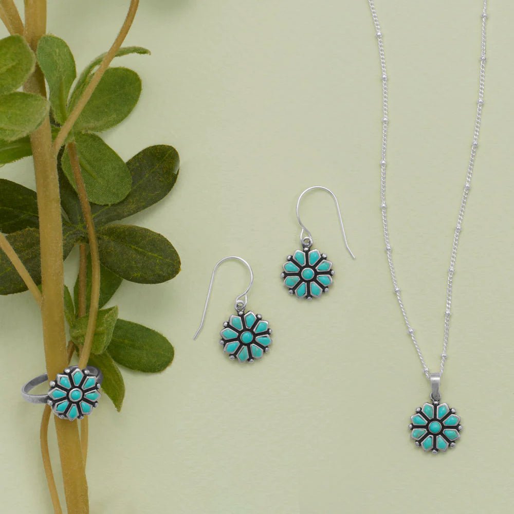 Reconstituted Turquoise Pendant with Flower Design