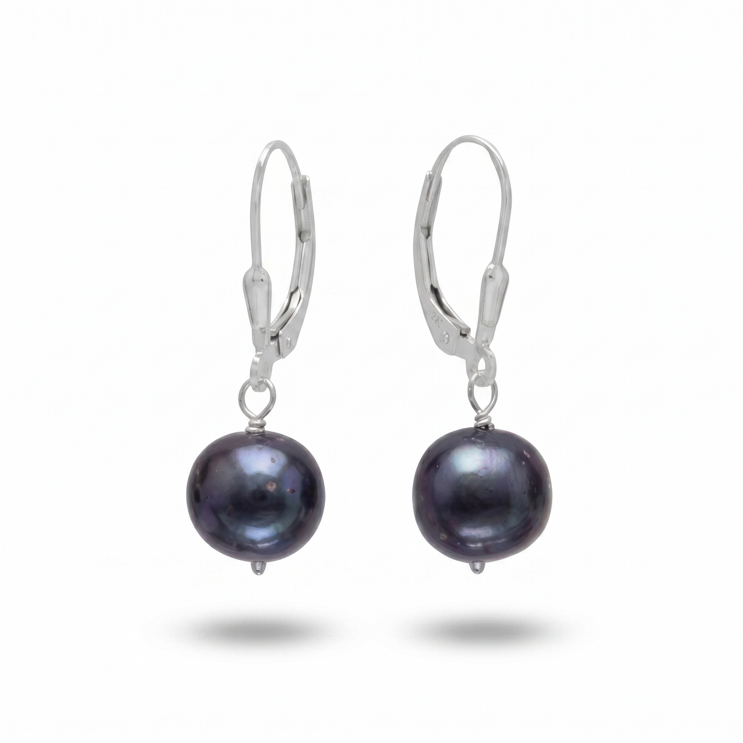 Pair of black pearl earrings on a white background