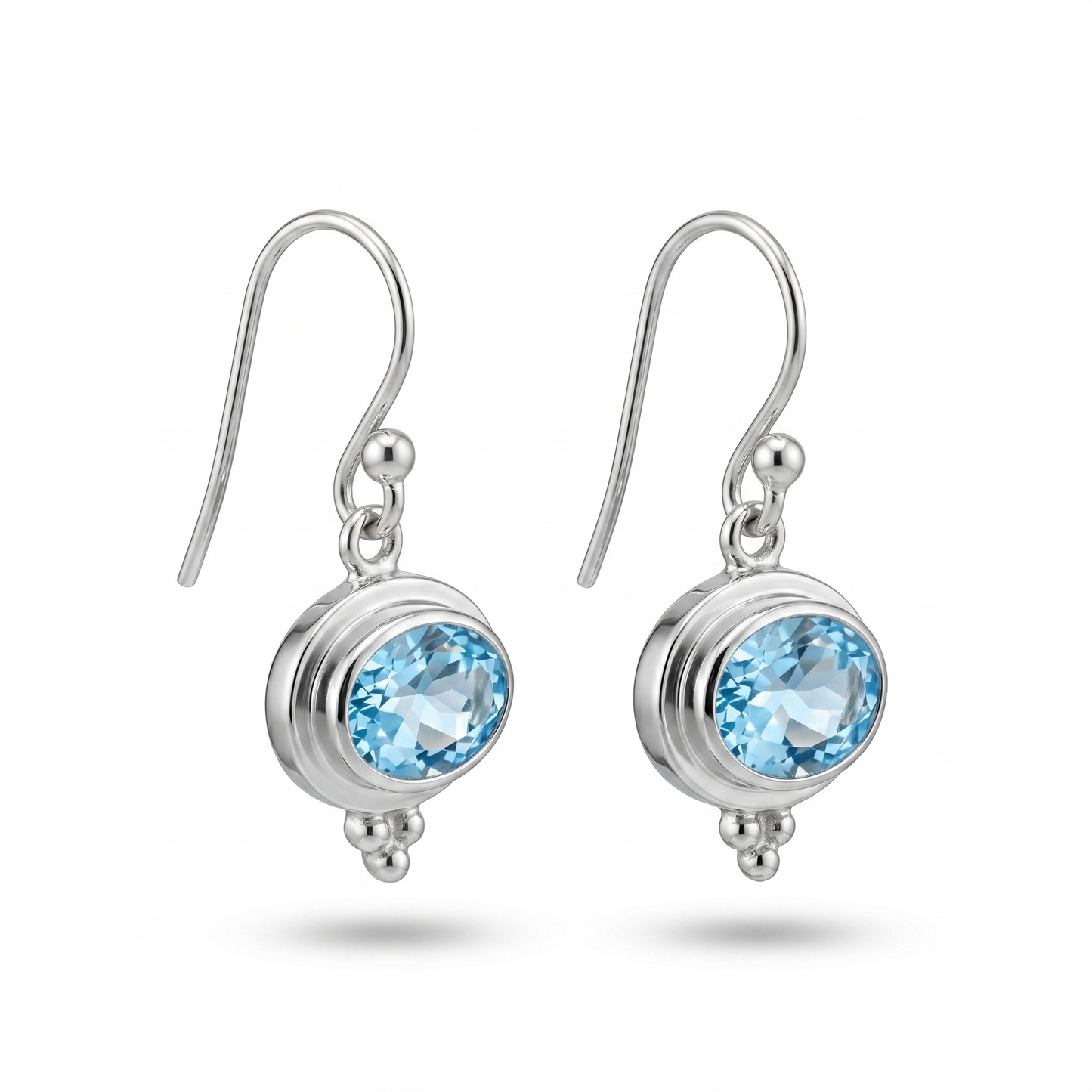 Oval Blue Topaz Bezel Dangle Earrings Rhodium Plated 925 Sterling Silver 11mm x 8mm