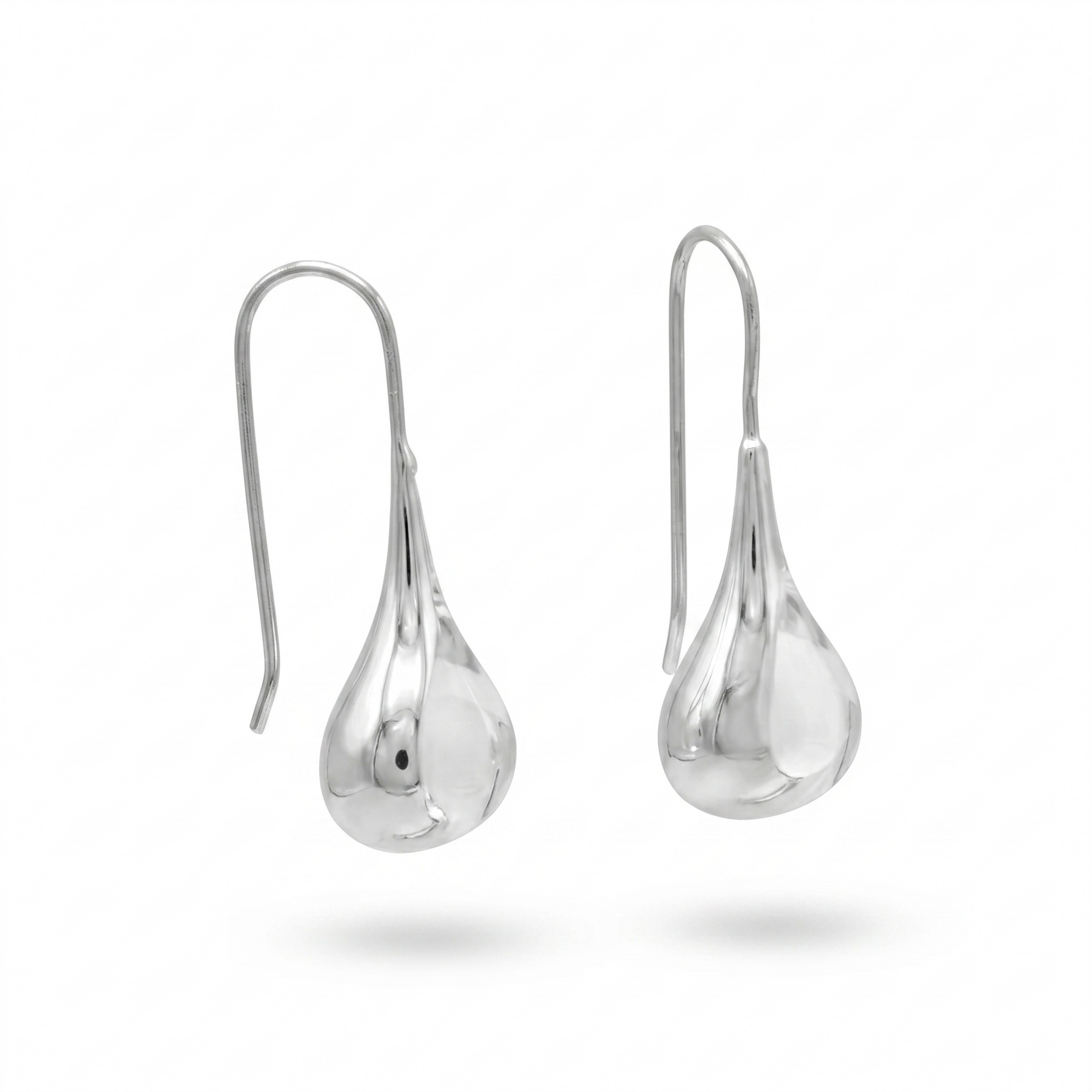 Pair of silver teardrop earrings on a white background