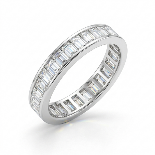 Diamond ring with baguette cut stones on a white background