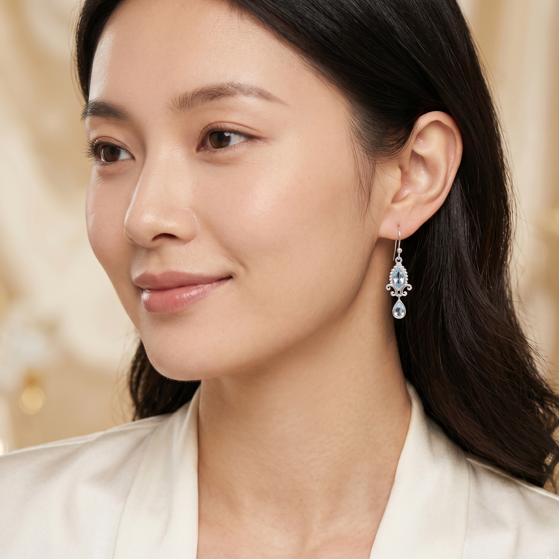 Woman wearing a sparkling earring with a blurred background
