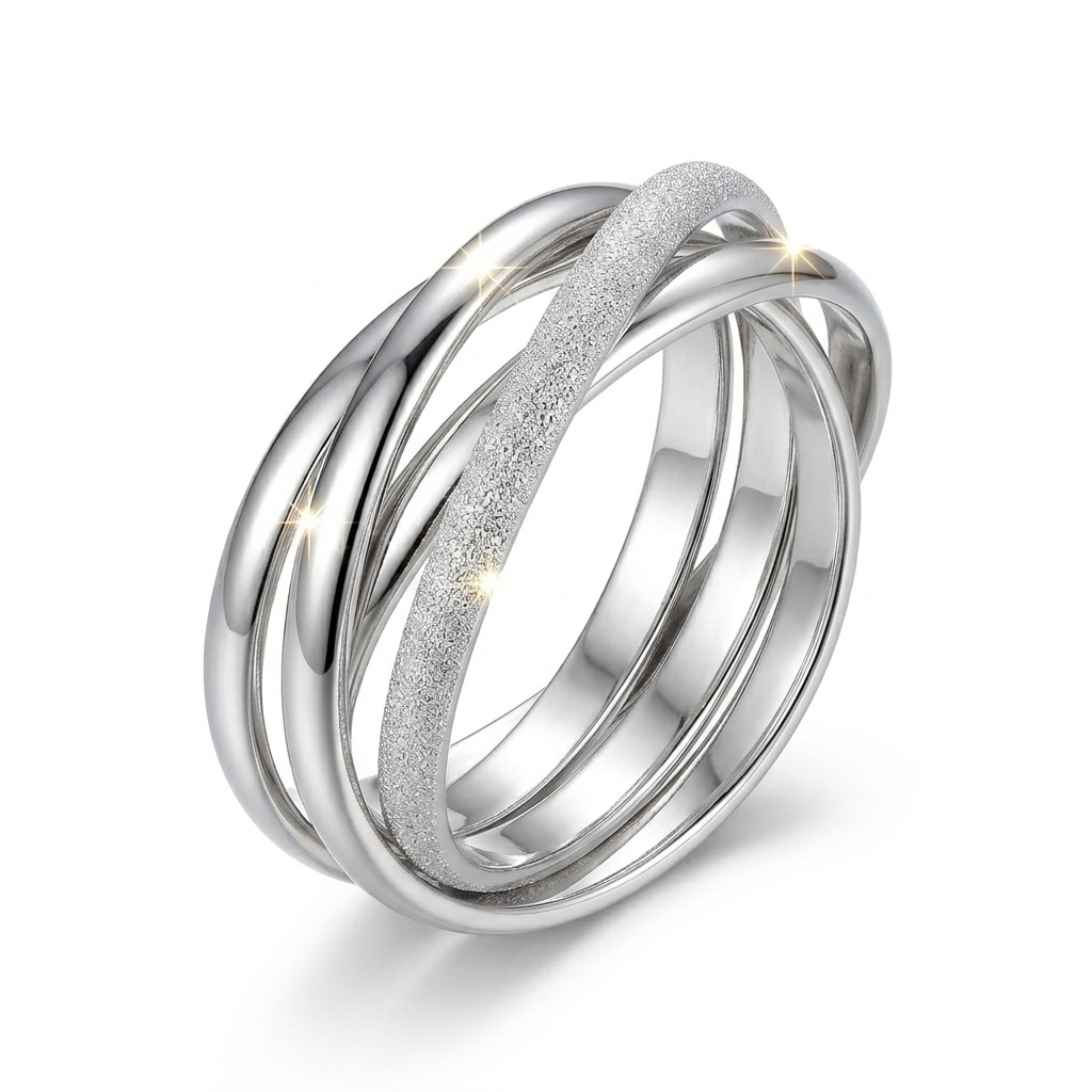 Silver interlocking rings on a white background