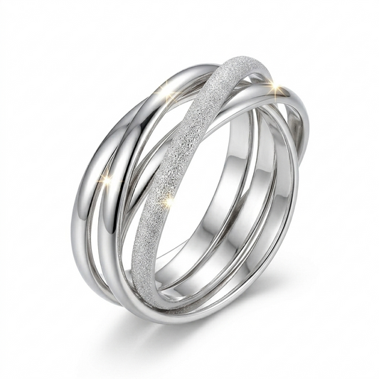 Silver interlocking rings on a white background