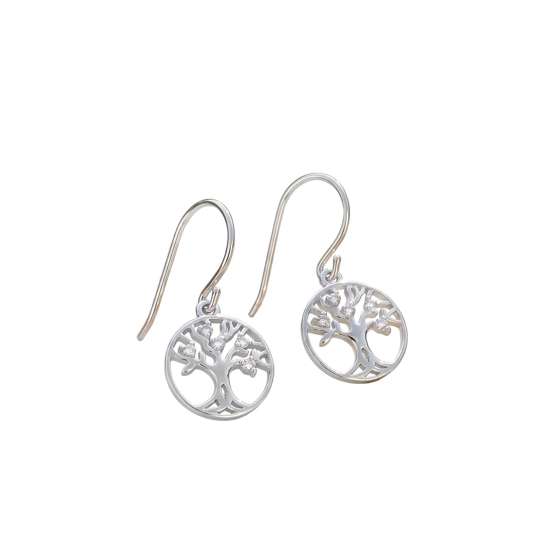Silver tree of life earrings on a wooden surface with a blurred natural background