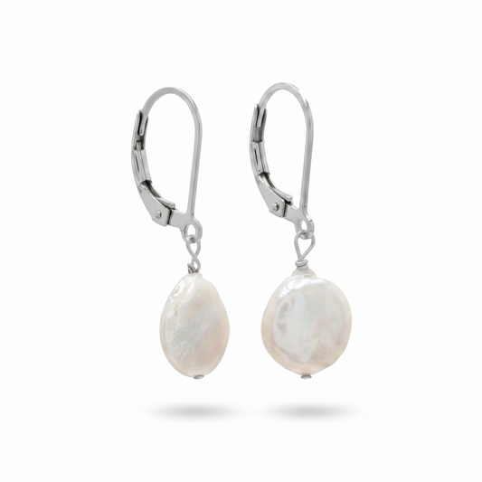 Pair of pearl earrings with silver hooks on a white background