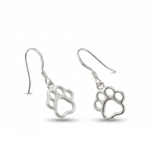 Silver paw print earrings on a white background with a wooden log and butterfly at the bottom.
