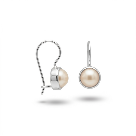 Pair of pearl earrings on a white background
