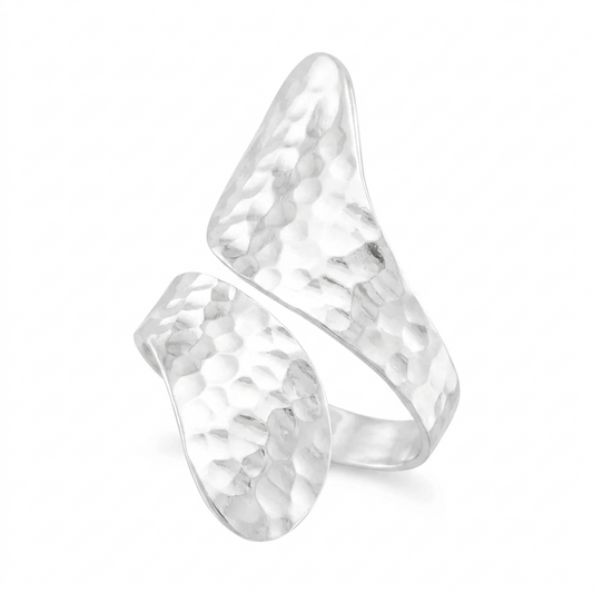 Silver ring with a textured design on a white background