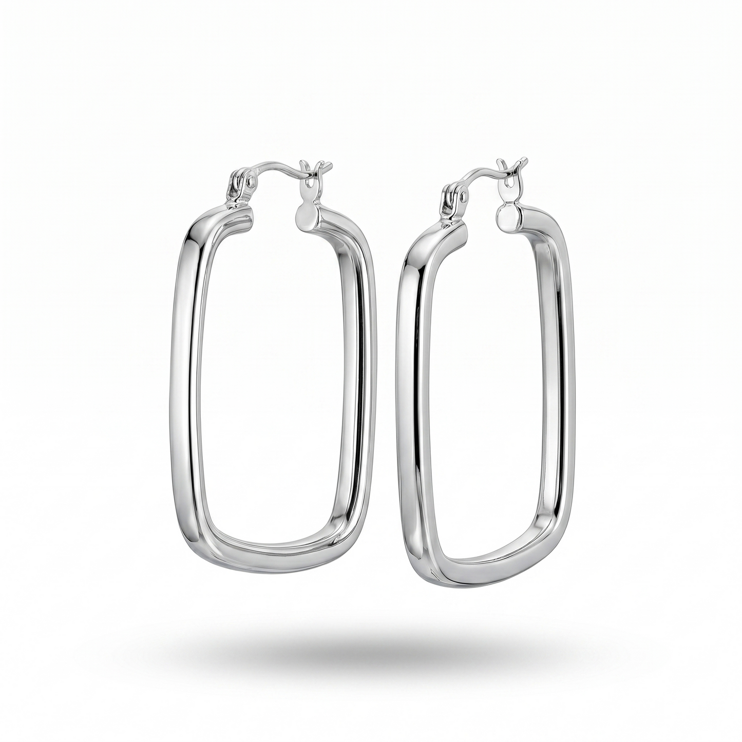 Silver hoop earrings on a white background