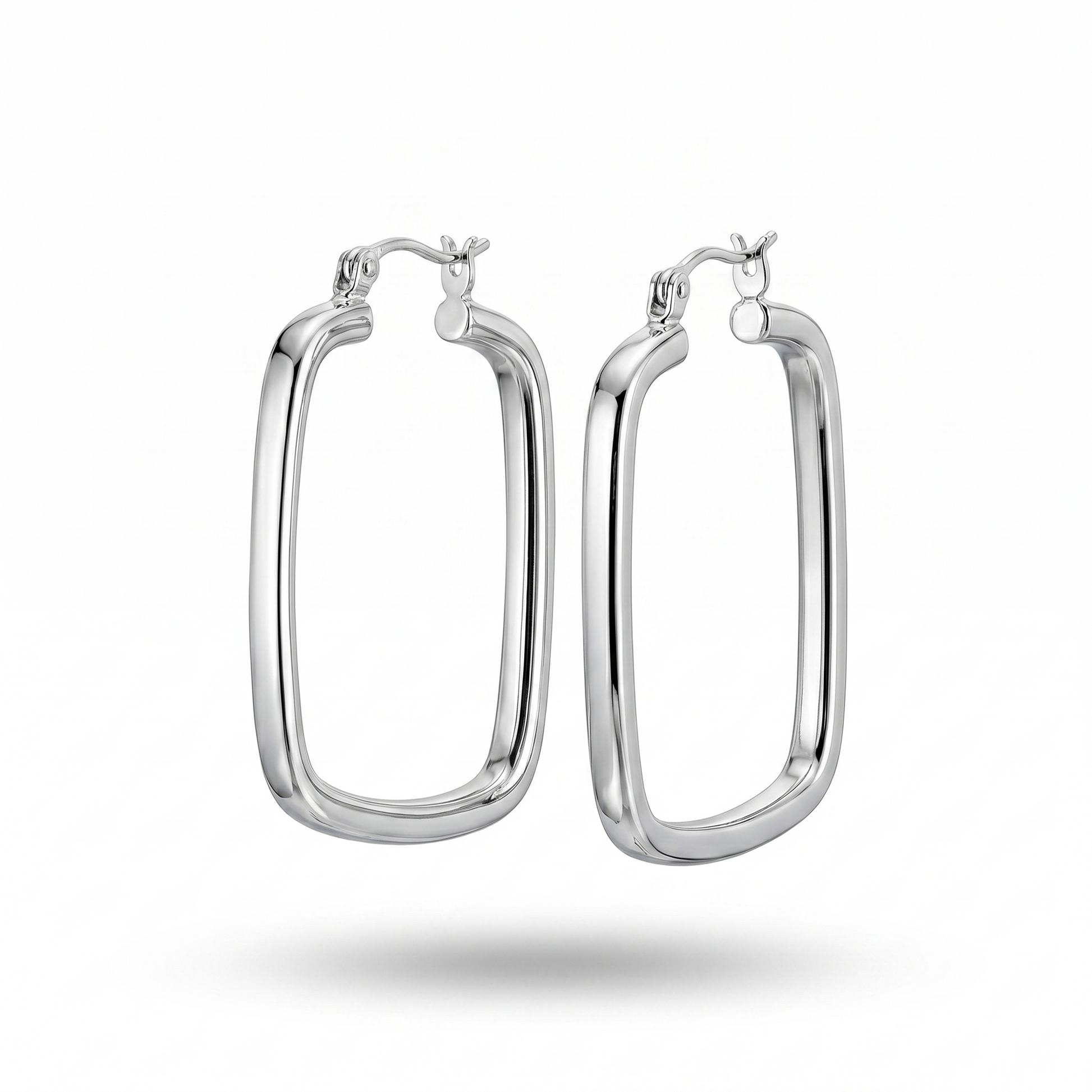 Silver hoop earrings on a white background