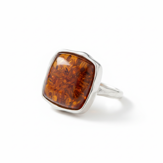 Baltic Amber Square Cushion Hammered Band Ring Angled White Background