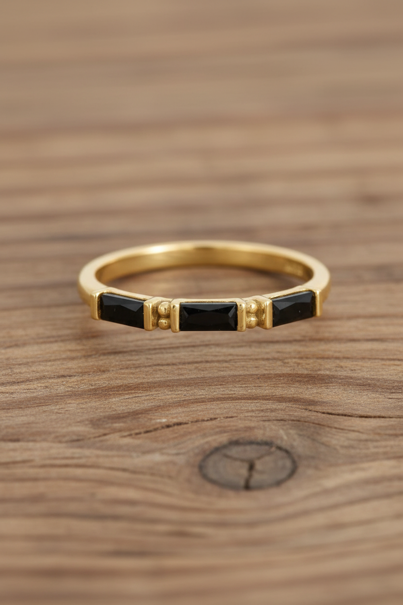 Black Baguette CZ Gold Ring Wood Background Same Series