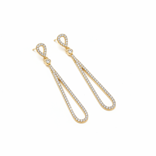 Detailed close-up of pear drop CZ earrings