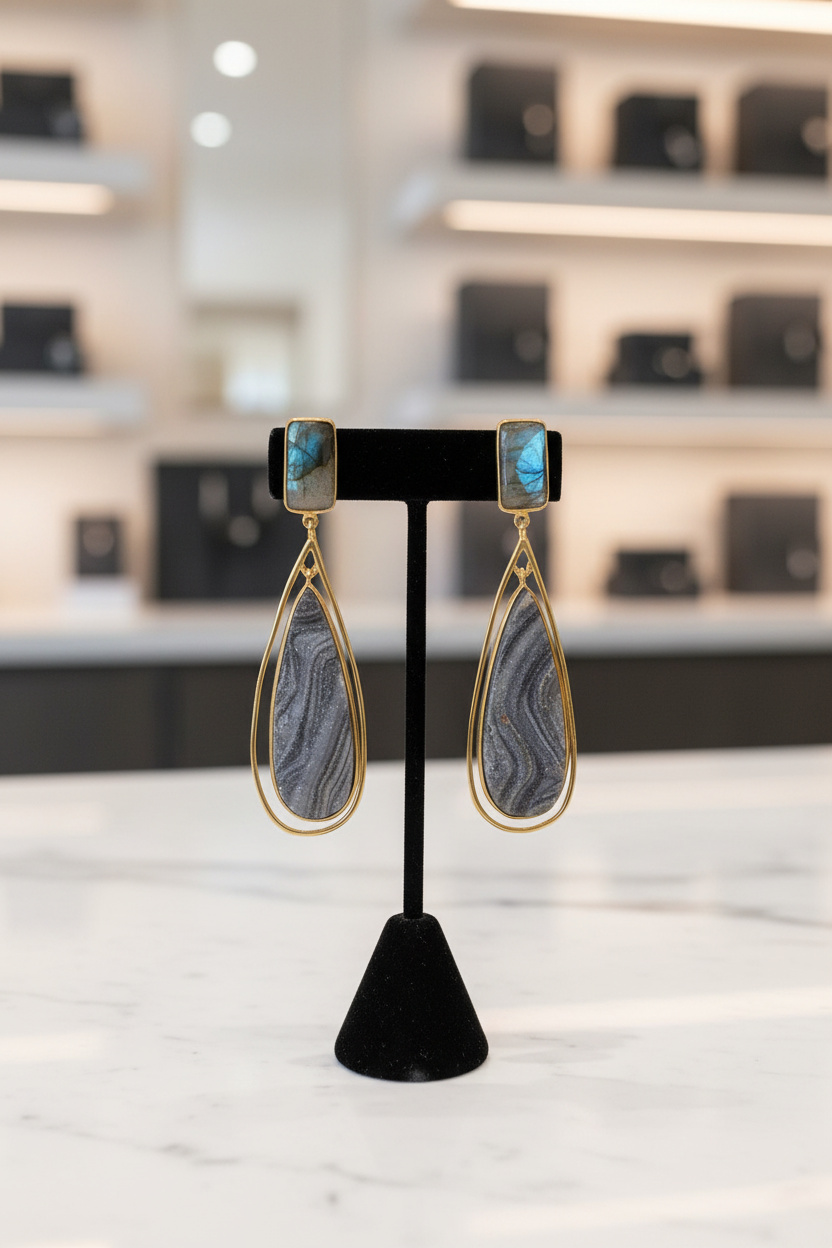 Earrings on black velvet in modern store