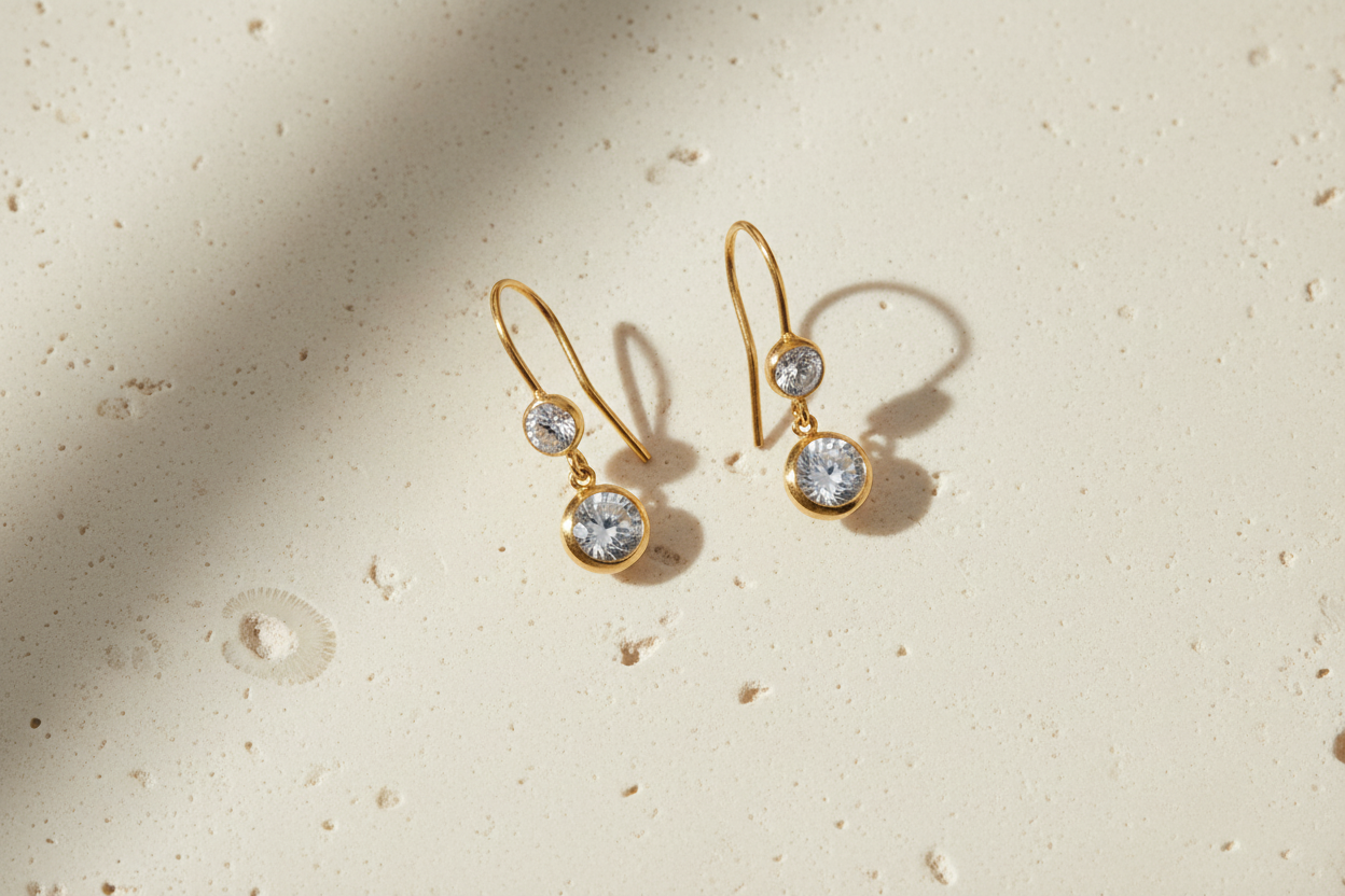 Earrings on limestone surface