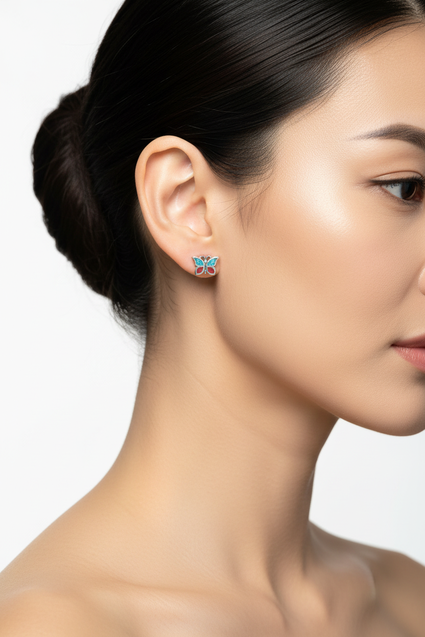 Elegant side profile with tiny butterfly studs