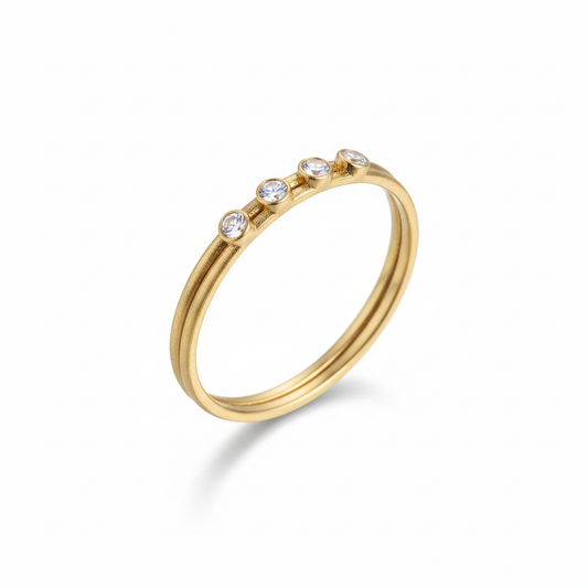 Four CZ Double Band Gold Ring Angled White Background HD