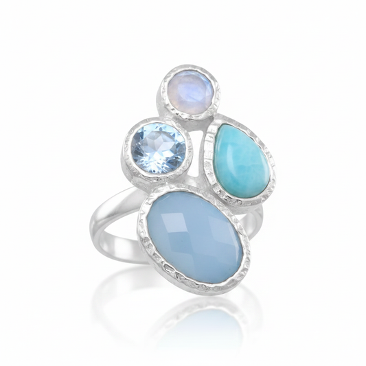 Four Stone Cluster Moonstone Topaz Larimar Chalcedony Silver Ring Supplier Reference Pure White Background Tilted Reflection 1x1