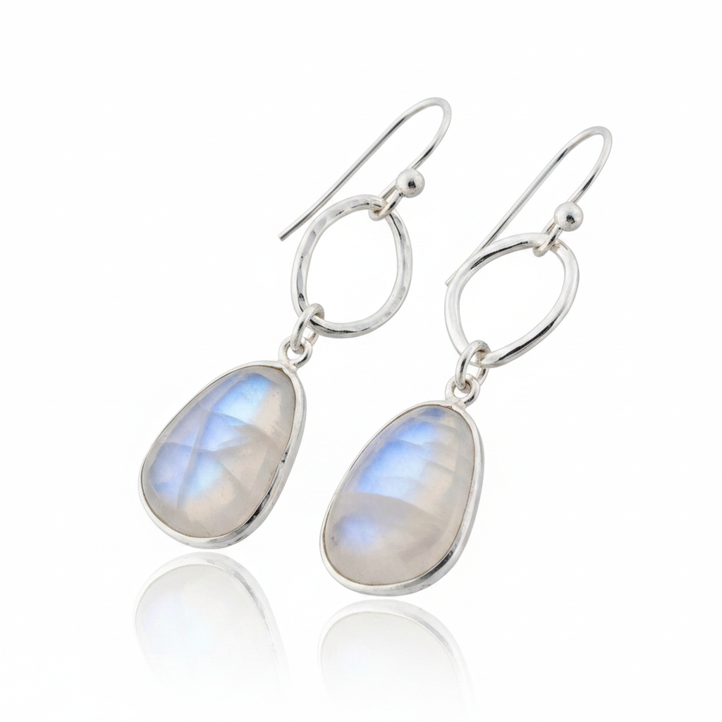 Freeform Moonstone Drop Earrings Hammered Oval Link Blue Adularescence Sterling Silver Pure White Background Tilted Reflection 1x1