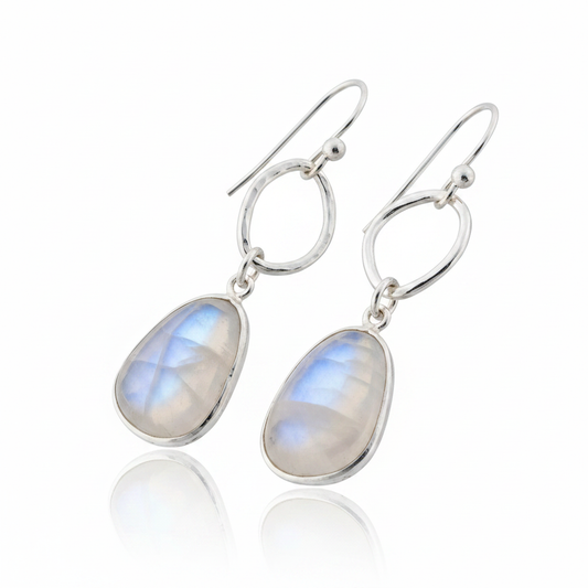 Freeform Moonstone Drop Earrings Hammered Oval Link Blue Adularescence Sterling Silver Pure White Background Tilted Reflection 1x1