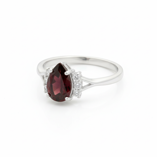 Garnet Pear Cut Silver Ring Angled White Background HD