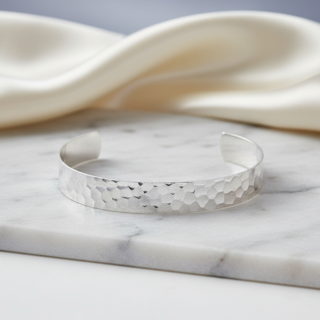 Hammered cuff bracelet with elegant background