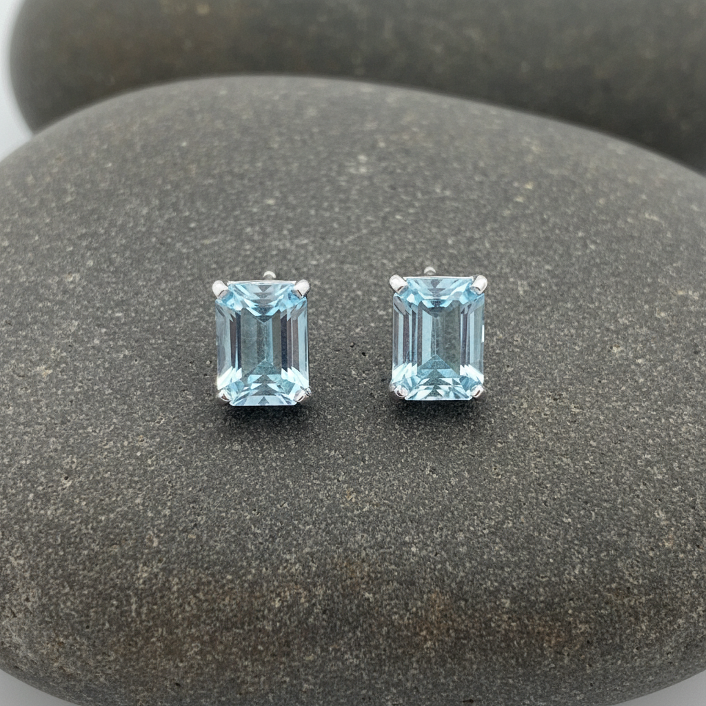 Azure Dreams | Rhodium Plated Sky Blue Topaz Studs 8x6mm Emerald Cut