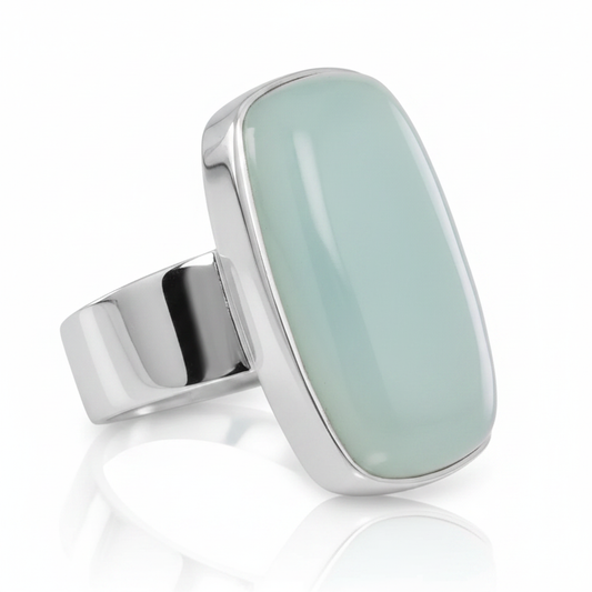 Large Oblong Aqua Chalcedony Modern Minimalist Wide Band Silver Ring Pure White Background Tilted Reflection 1x1