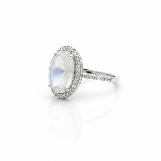 Large Oval Moonstone CZ Halo Pave Band Silver Ring Pure White Background Tilted Clear 1x1