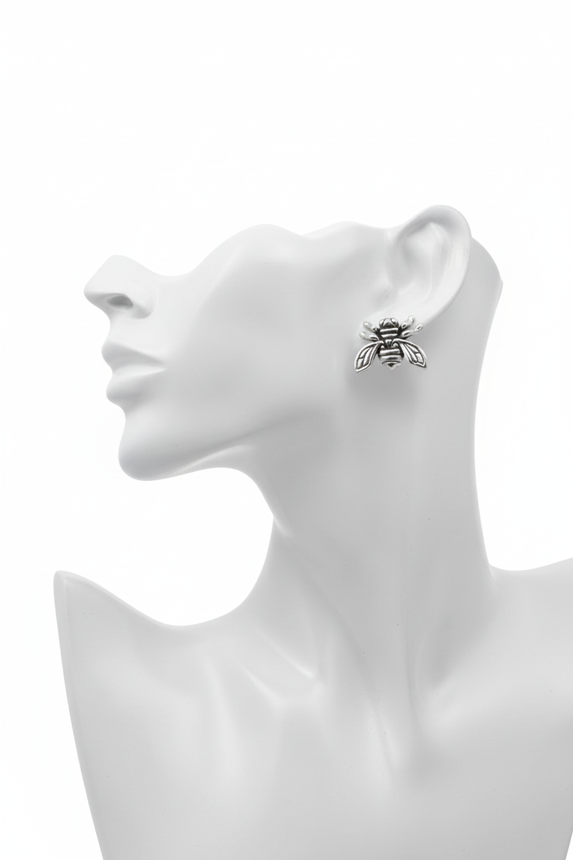 Mannequin wearing bee earrings - side view