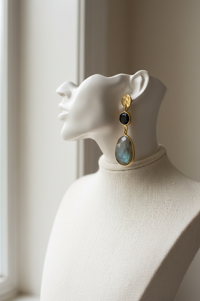 Midnight flash earrings on cream mannequin