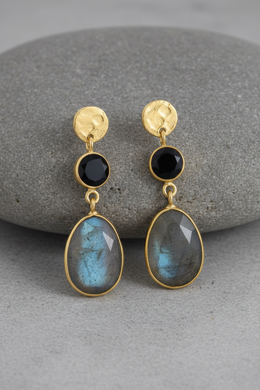 Midnight flash earrings on grey stone