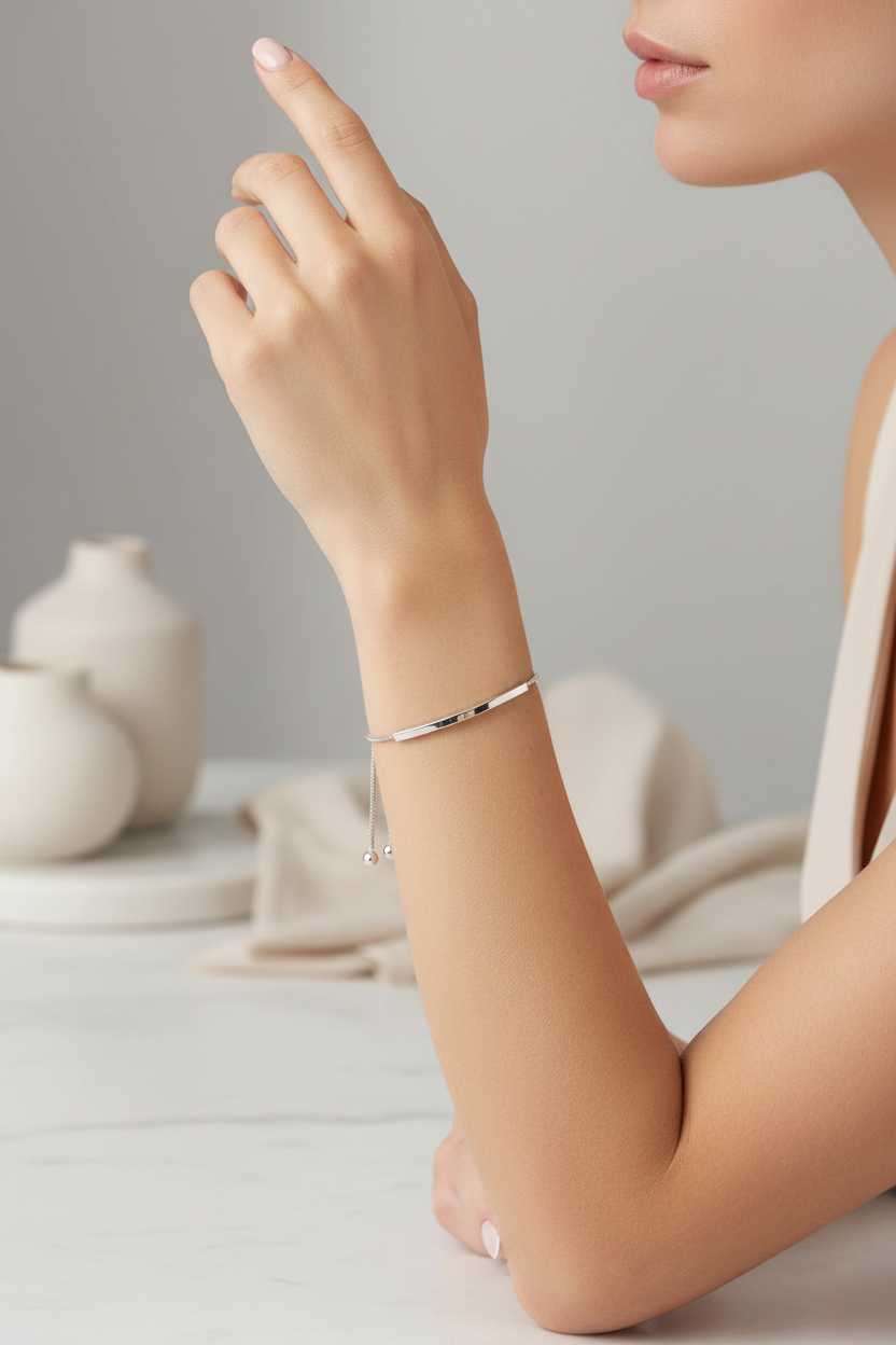 Model wearing silver bar bracelet - side profile
