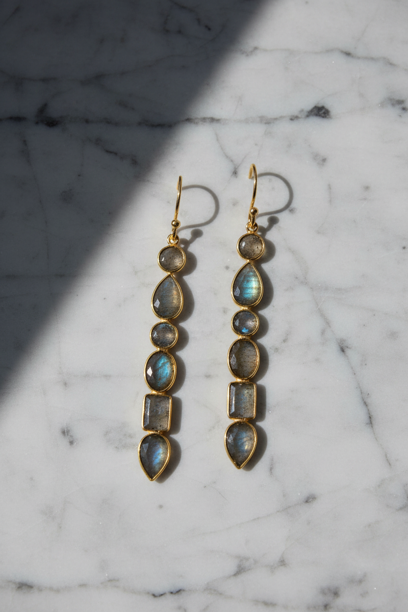 Multi-shape labradorite earrings on grey marble