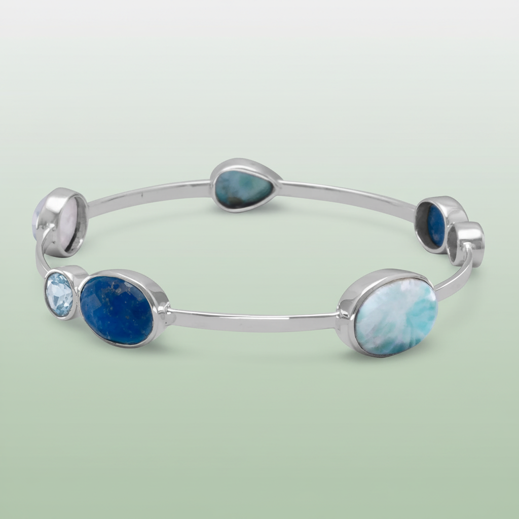 Multi-stone bangle on sage green gradient background