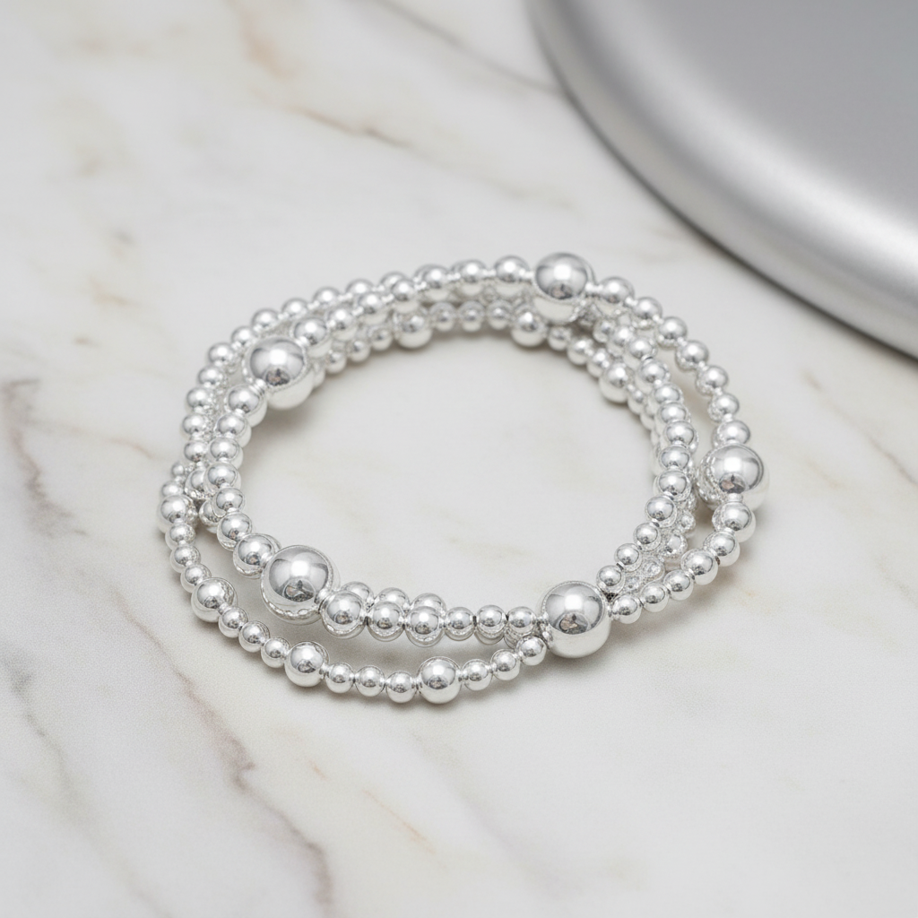 Multi-strand beaded bracelet with elegant background