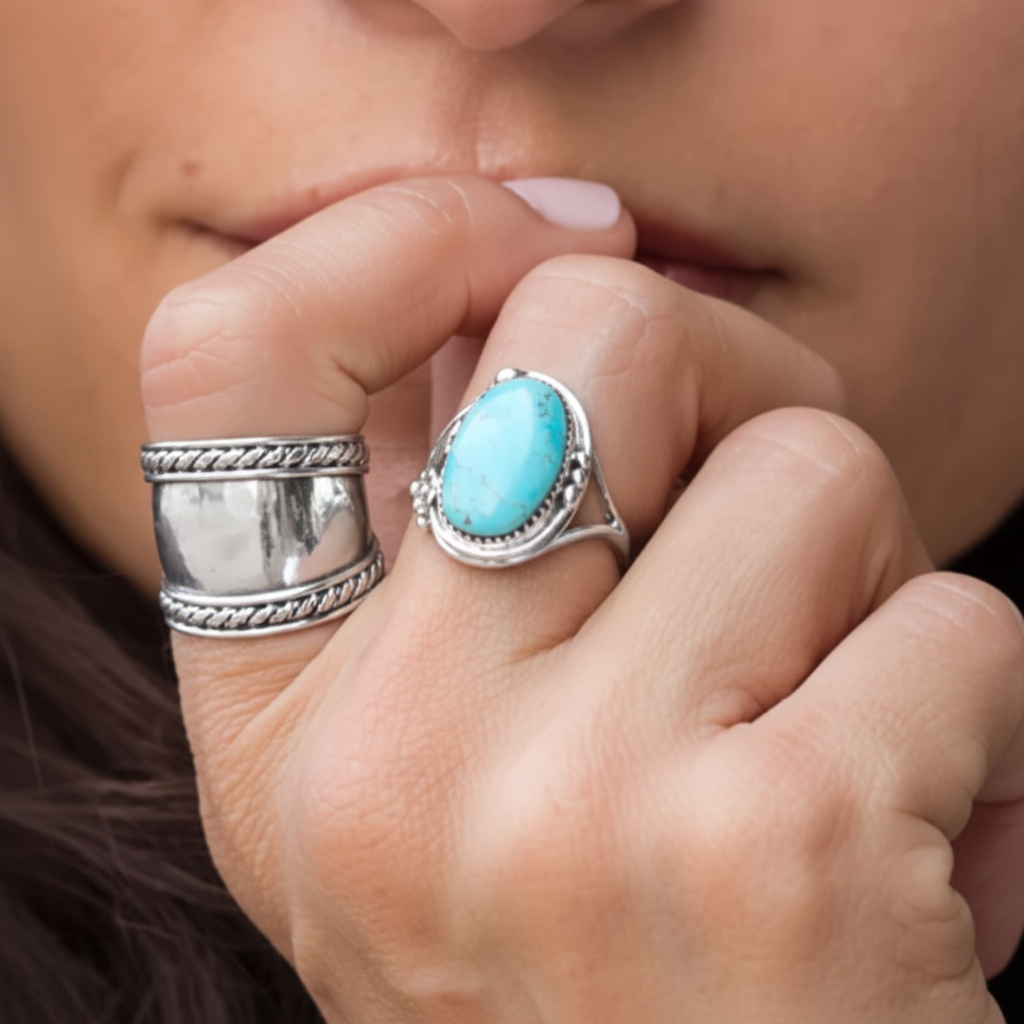 Navajo Turquoise Ring Wide Silver Band Different Female Hand Fist Pose Near Lips 1x1