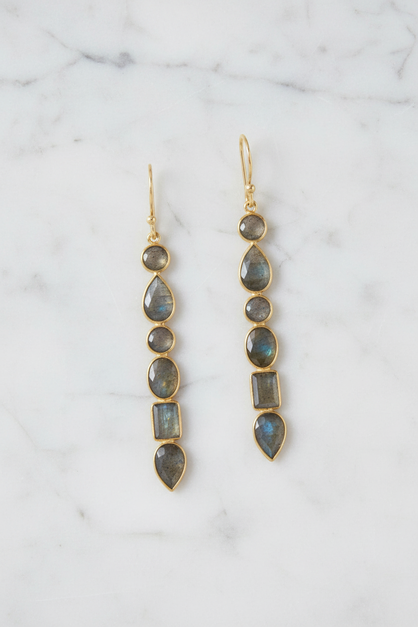 Northern lights cascade earrings on white marble
