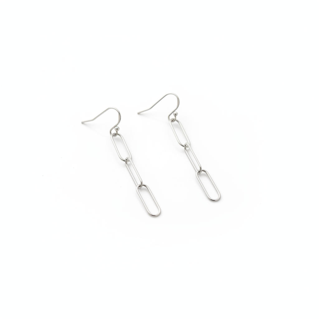 Pair of paperclip chain earrings on white