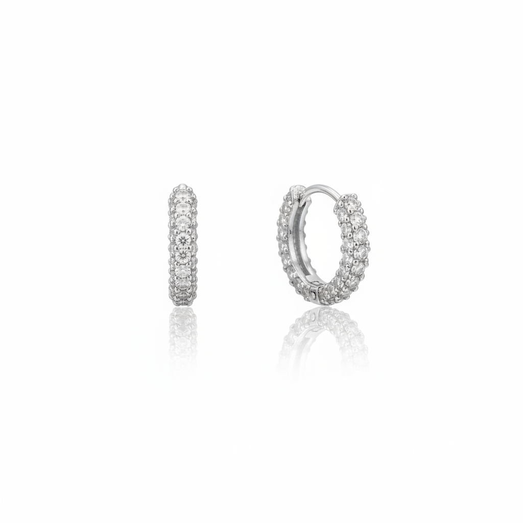Pair of rhodium CZ click hoops on white