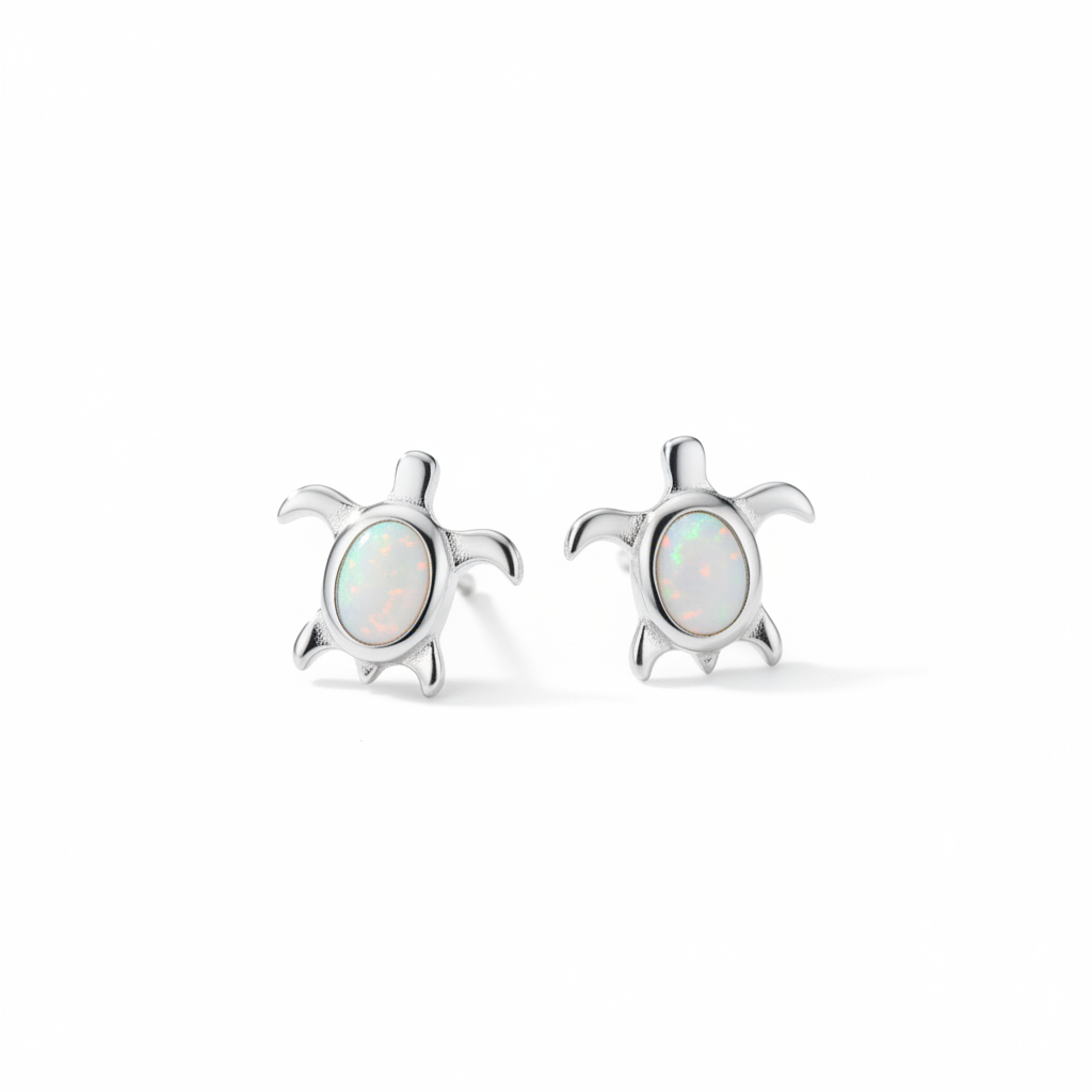 Pair of sea turtle earrings side by side