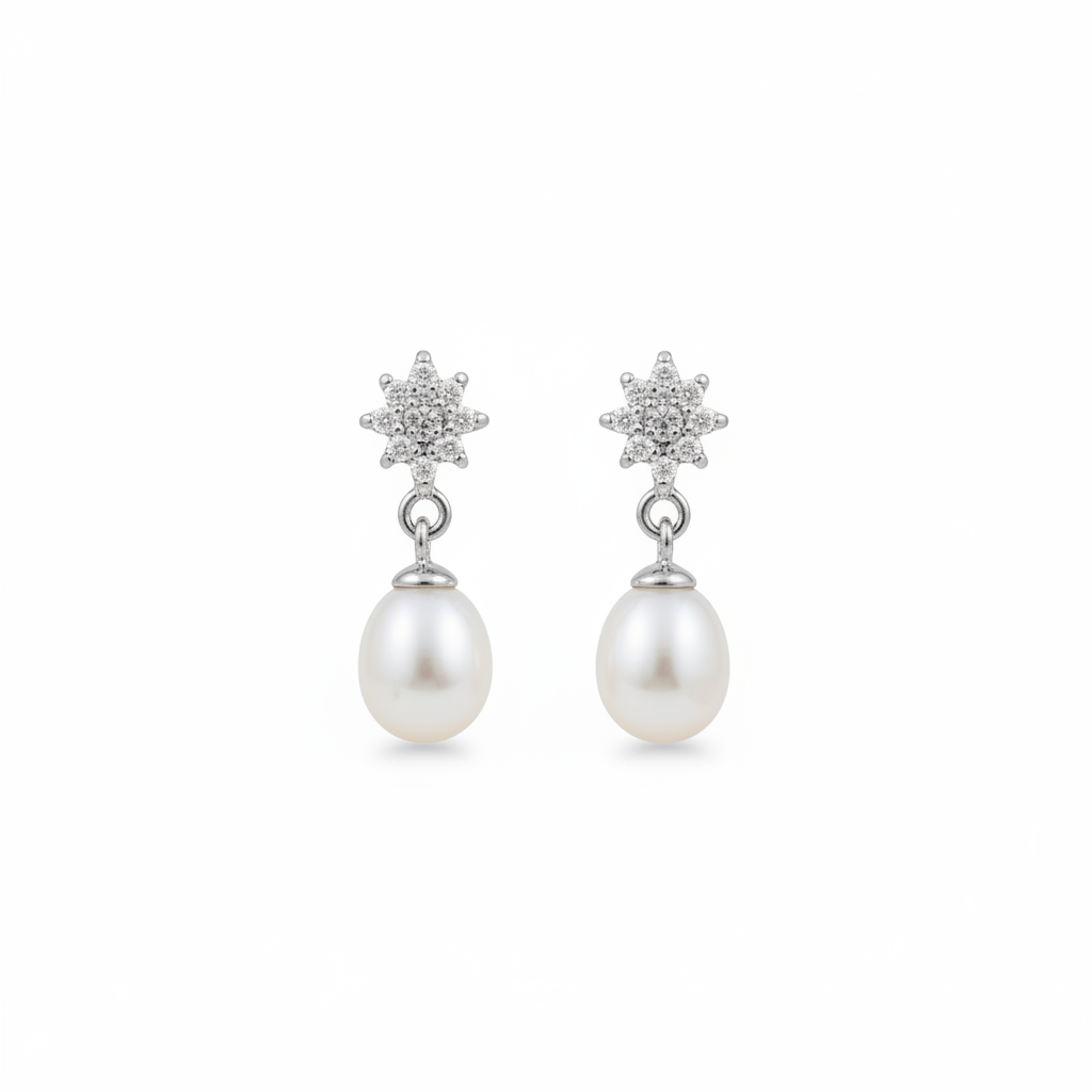Pearl earrings close-up on white background