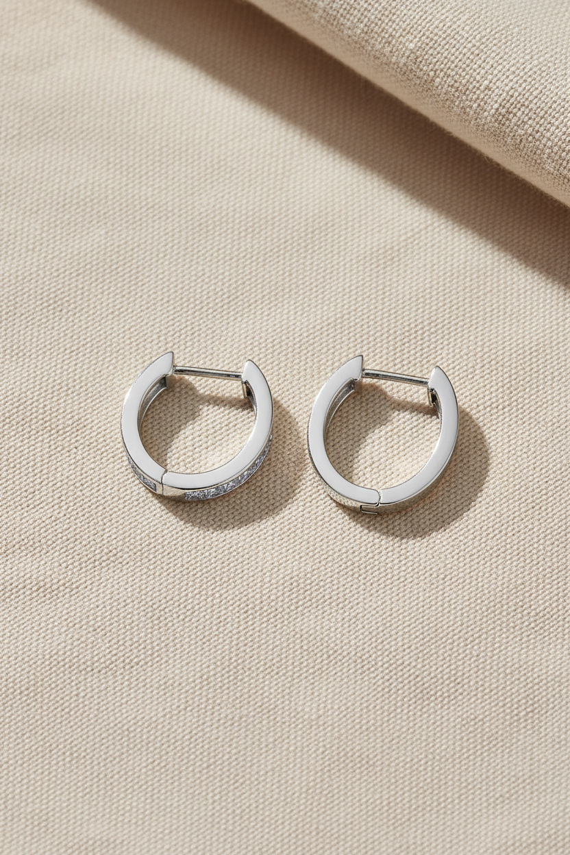 Rhodium CZ hoops on beige cotton