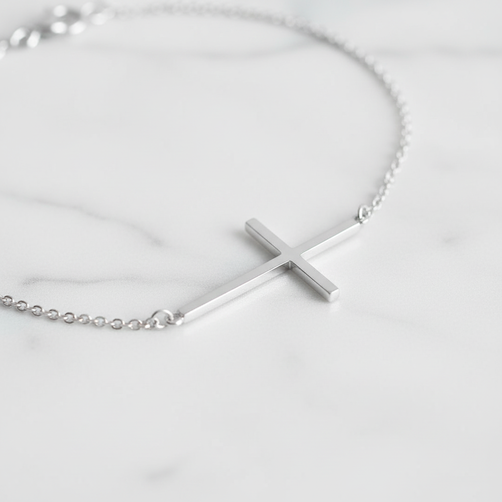 Sideways cross bracelet on marble