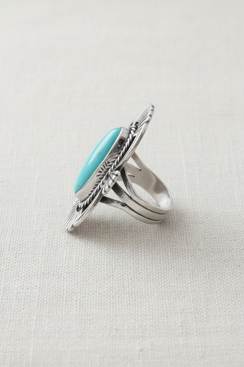Southwestern Turquoise Ring Side View on Linen Background
